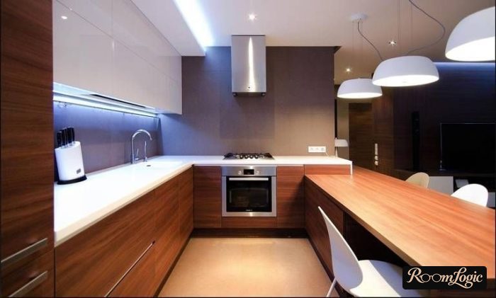 U-shaped kitchen design with a window