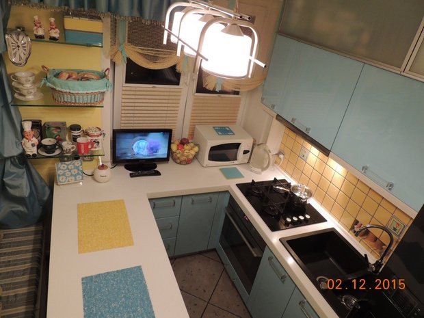 U-shaped kitchen in tiny apartment