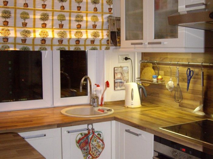 U-shaped kitchen in tiny apartment