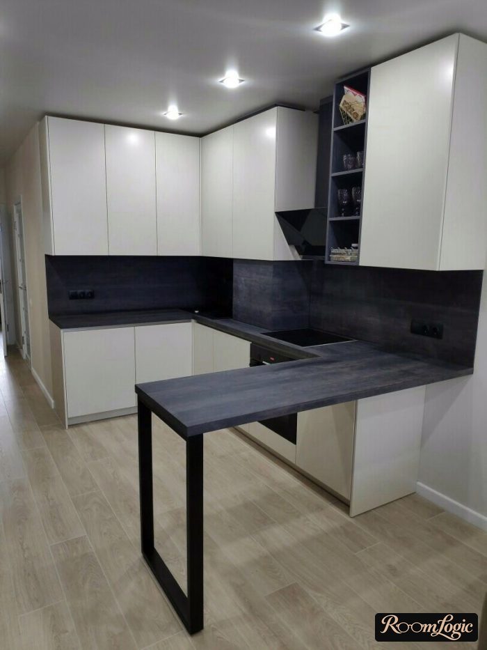 u-shaped kitchen with a breakfast bar