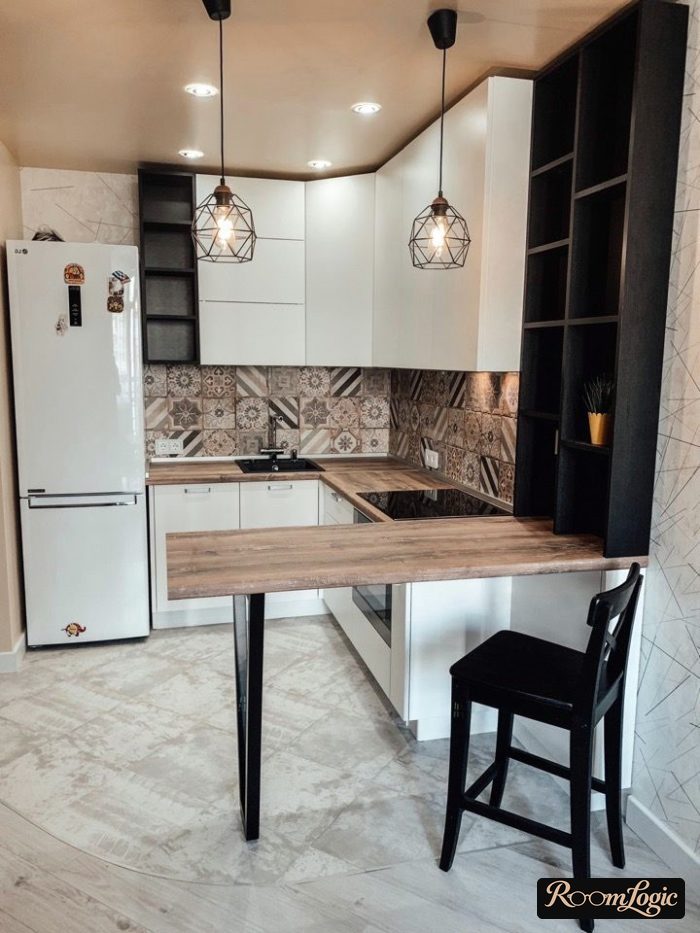 U-shaped kitchen with a breakfast bar in modern style