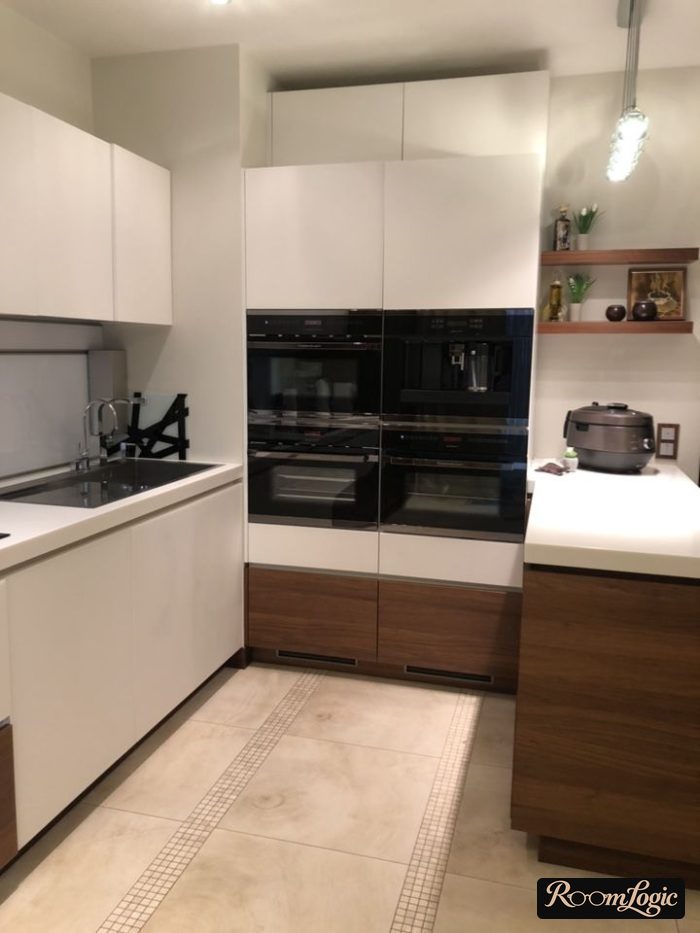 U-shaped kitchen with a built-in peninsula for appliances