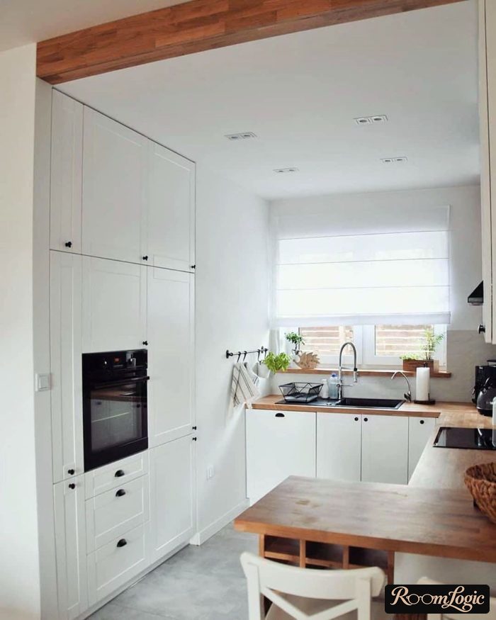 U-shaped kitchen with a window