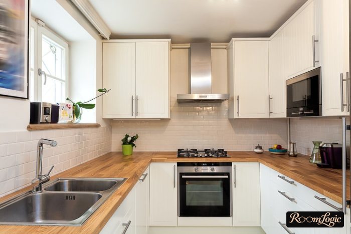 U-shaped kitchen with a window