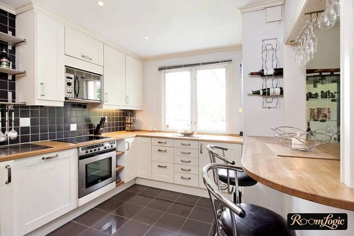 U-shaped kitchen with a window