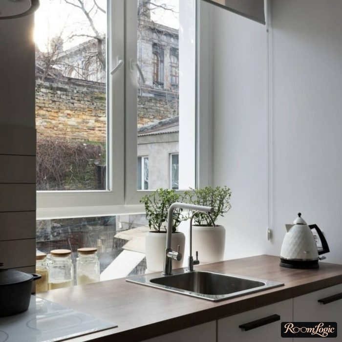 U-shaped kitchen with a window