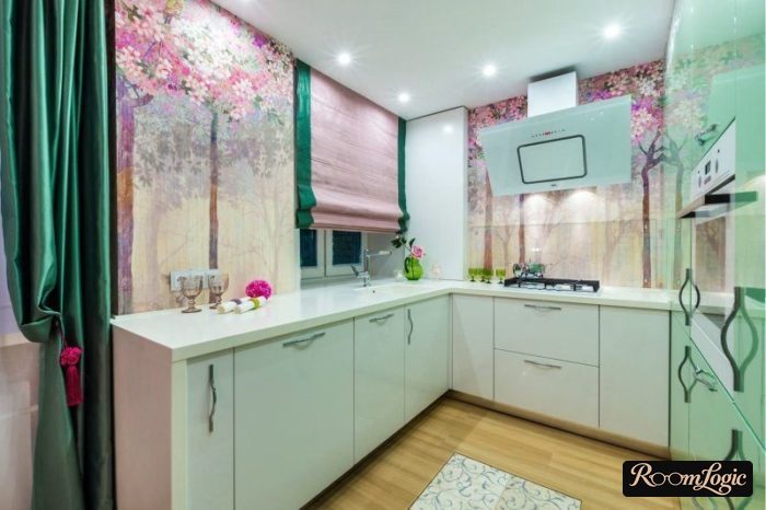U-shaped kitchen with a window and breakfast bar