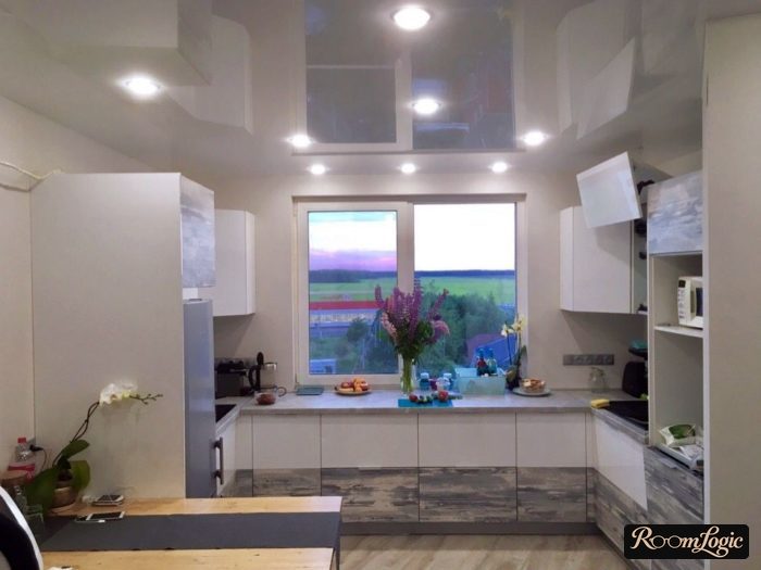 U-shaped kitchen with sink by the window