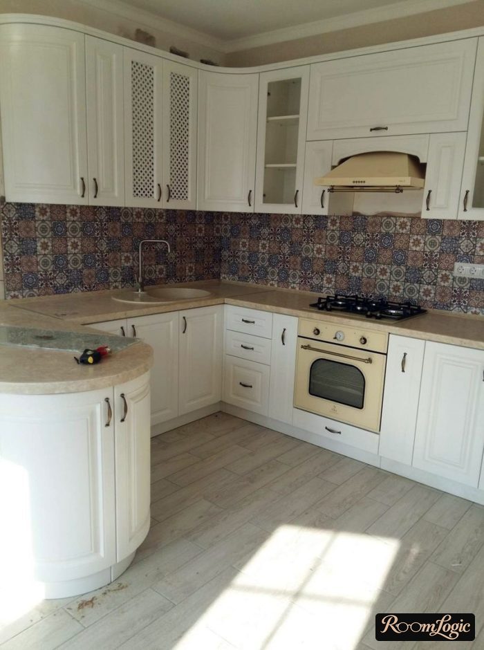U-shaped white and black kitchen
