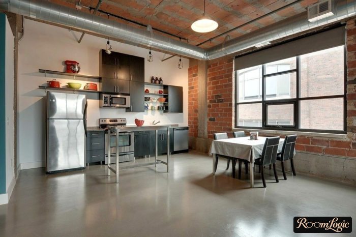 unfinished loft-style ceiling and walls in the kitchen