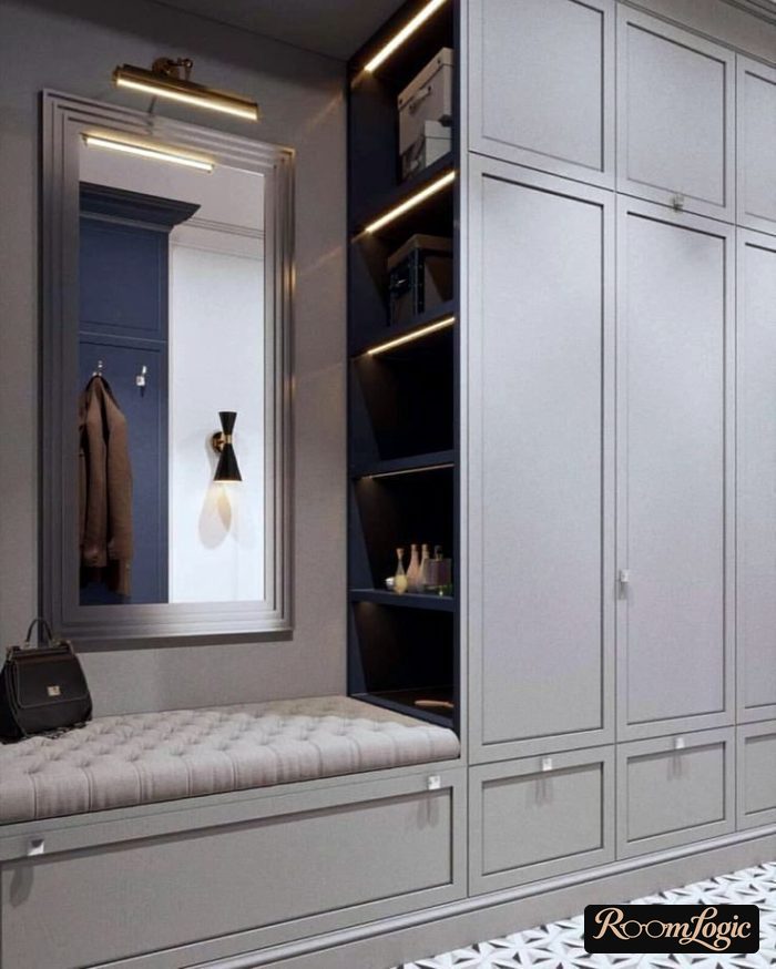 unusual entryway with gray closet and hidden lighting