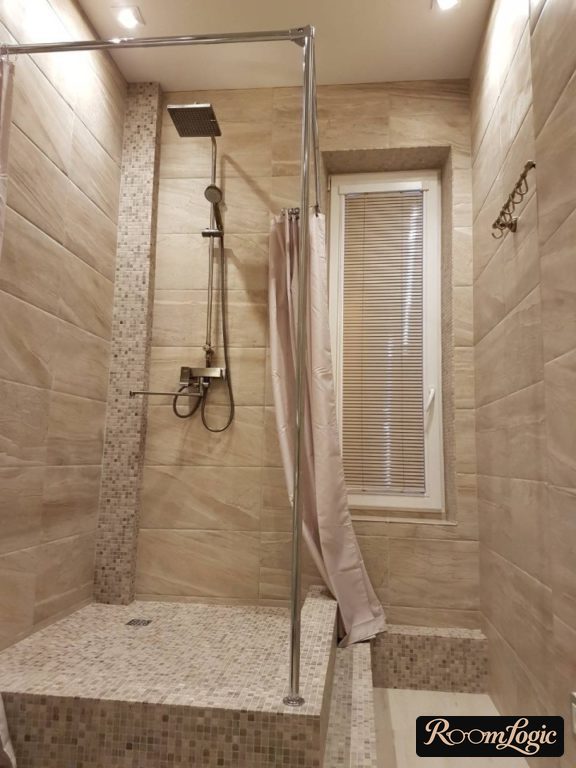 very small shower with a curtain