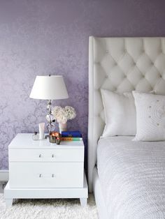violet wallpaper with silver pattern in the bedroom