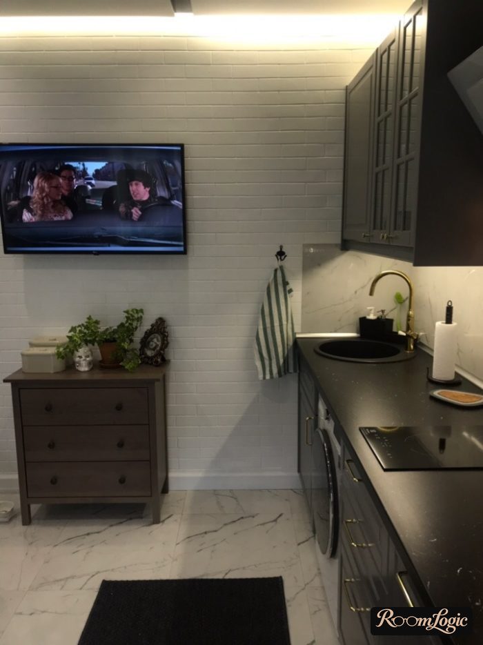 wall lighting in a gray kitchen