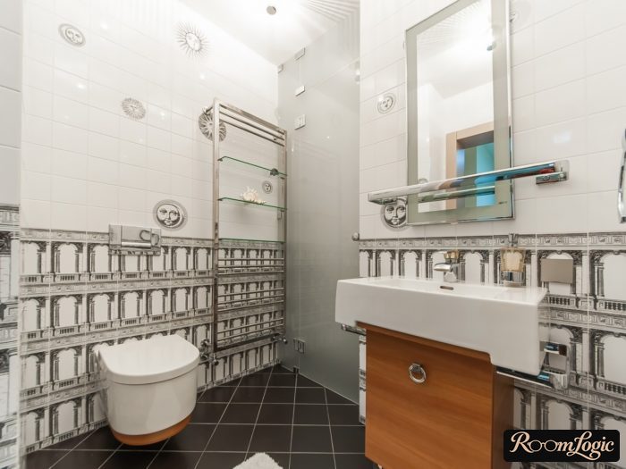 wall tiling in bathroom with two types of tile