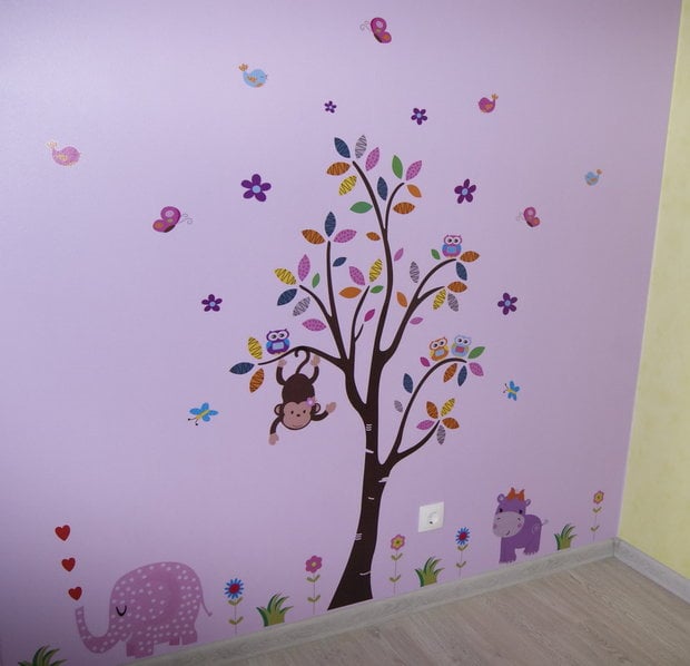 wall with stickers in kids' room for girl