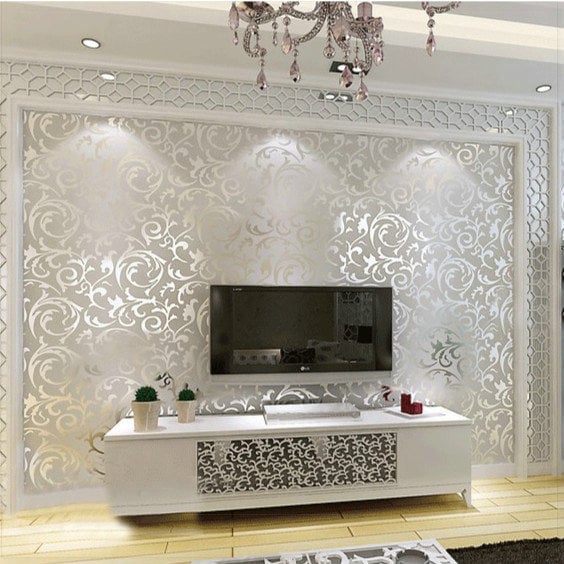 wallpaper in the bedroom behind the television