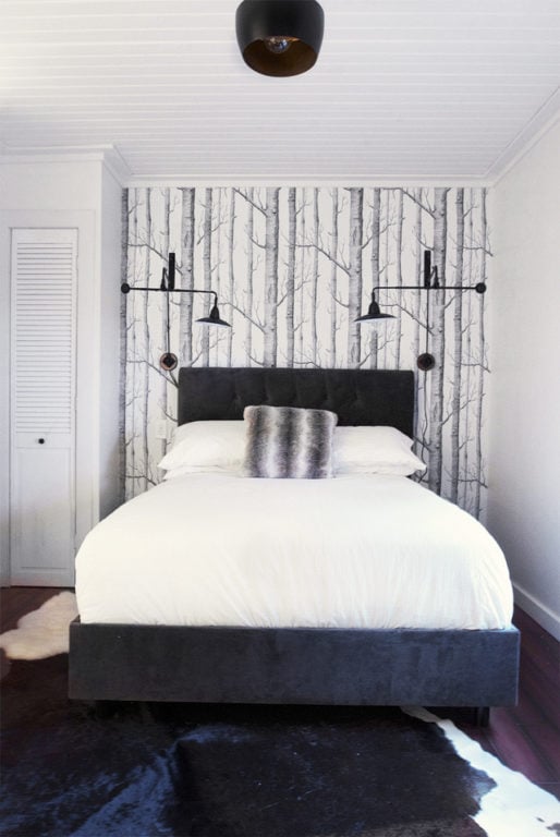 wallpaper with forest design in the bedroom