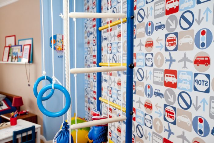 wallpaper with symbols in kids' room