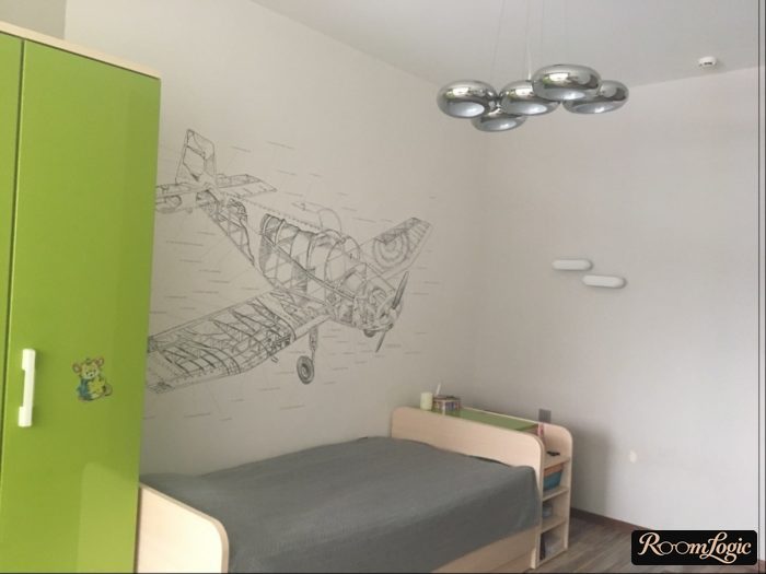 wallpaper with technical drawings in a teenage boy's room