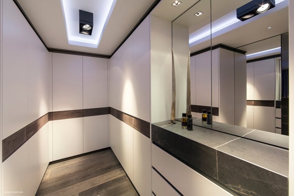 wardrobes along all the walls of the hallway