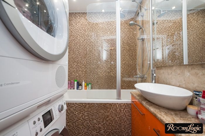 washer and dryer in small bathroom