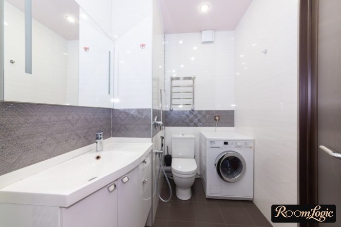 washer in combined bathroom