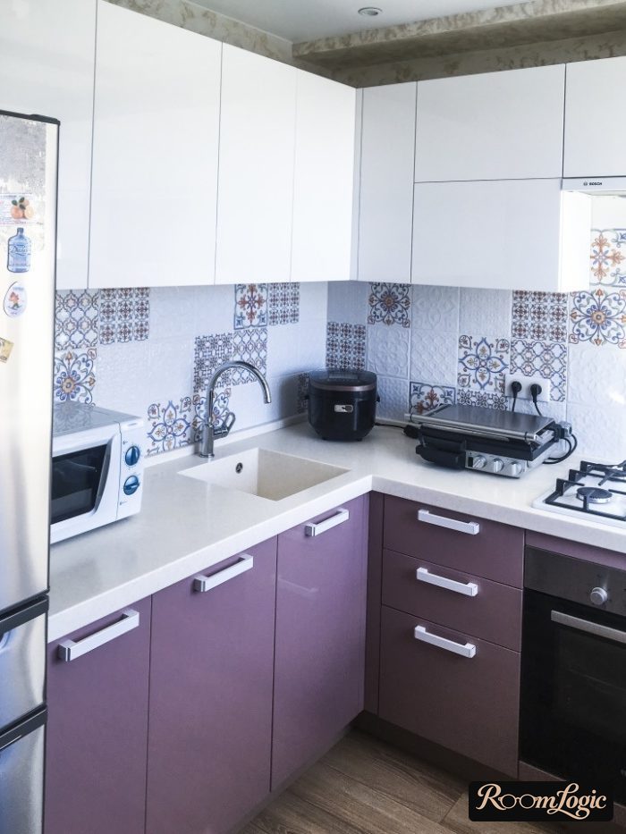 White acrylic kitchen countertop in a tiny apartment
