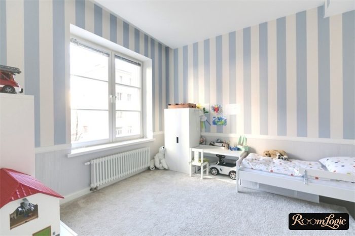 white and light blue striped wallpaper in a modern boys' room