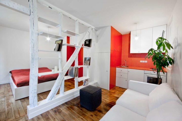 white and red kitchen with living room