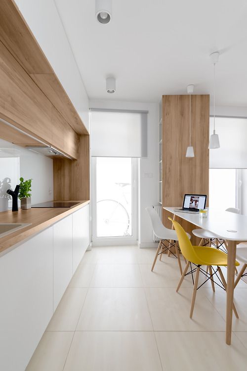 white color and light wood on the kitchen