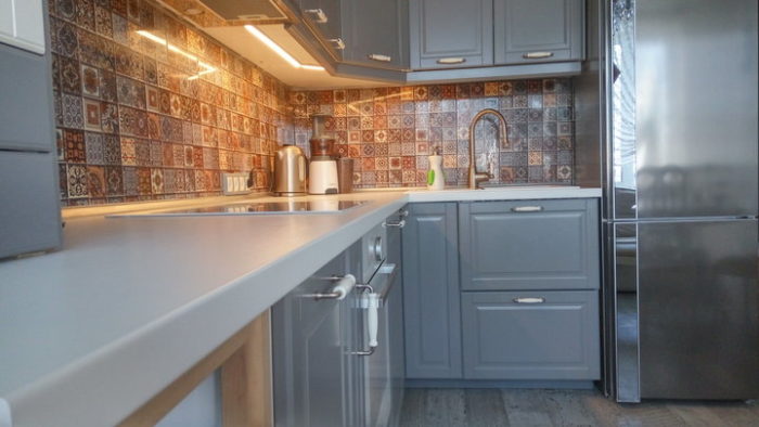 White countertop in a gray kitchen