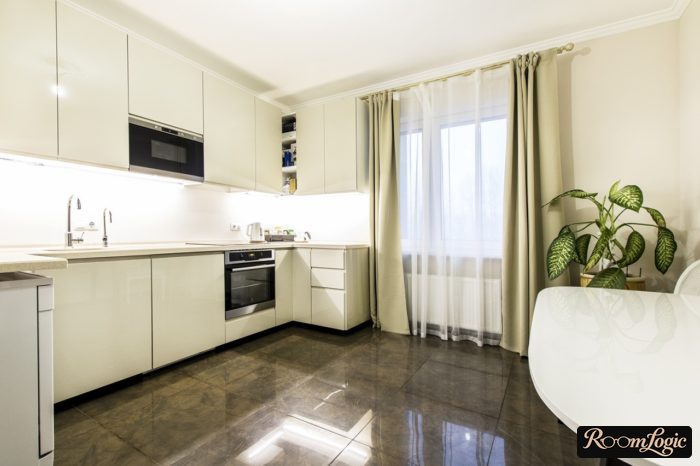 White curtains and sheers in the kitchen