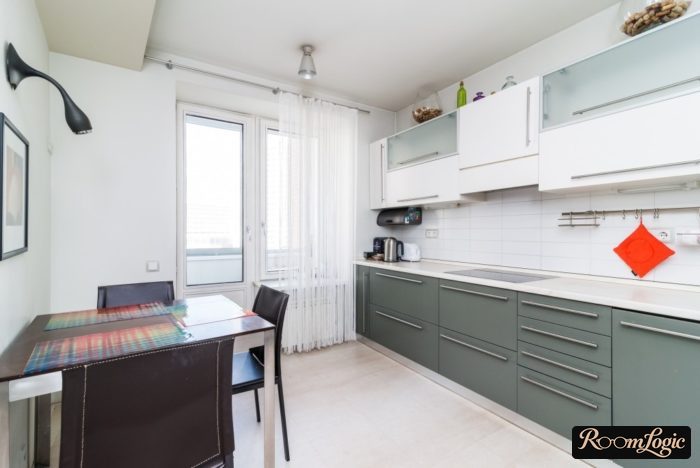 White drapery threads in the kitchen interior