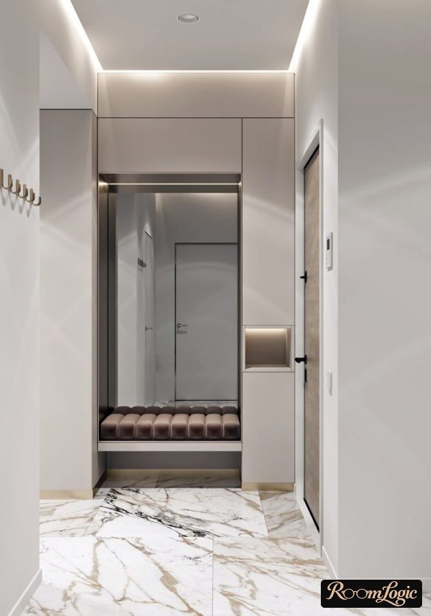 White entryway in a modern apartment with marble-look tile