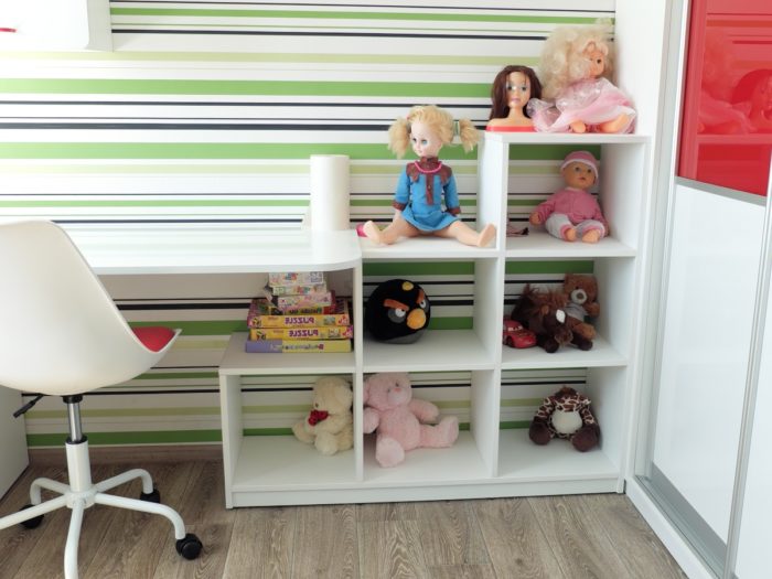 White furniture for mixed-gender children in a children's room