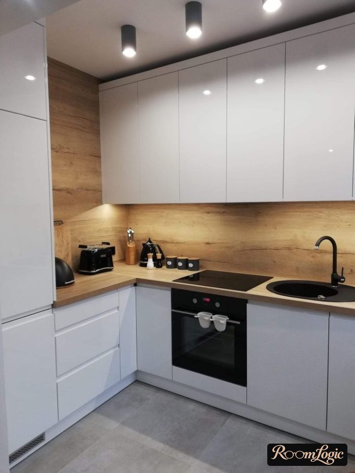 White glossy kitchen in modern style with wooden countertop and backsplash