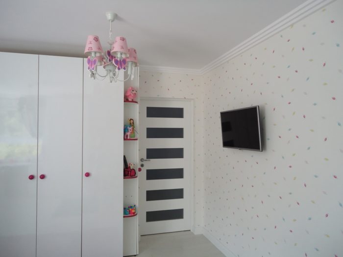 white glossy wardrobe in the kids’ room