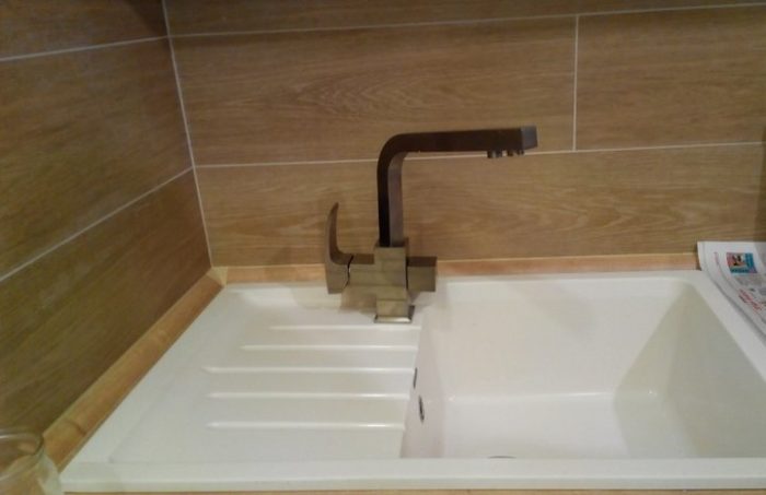 White grout on the kitchen backsplash tile