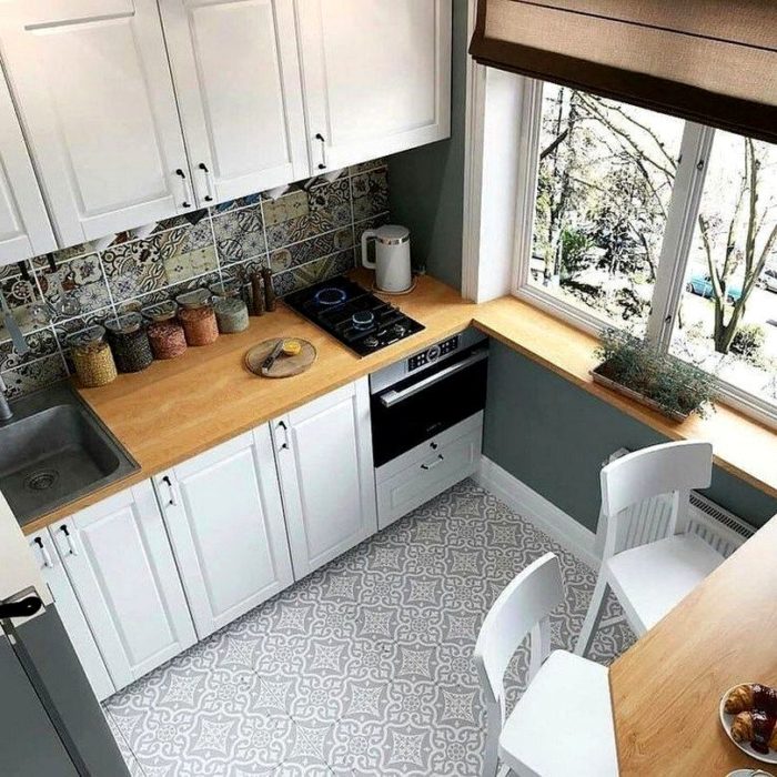 white kitchen in a tiny apartment in a Scandinavian style