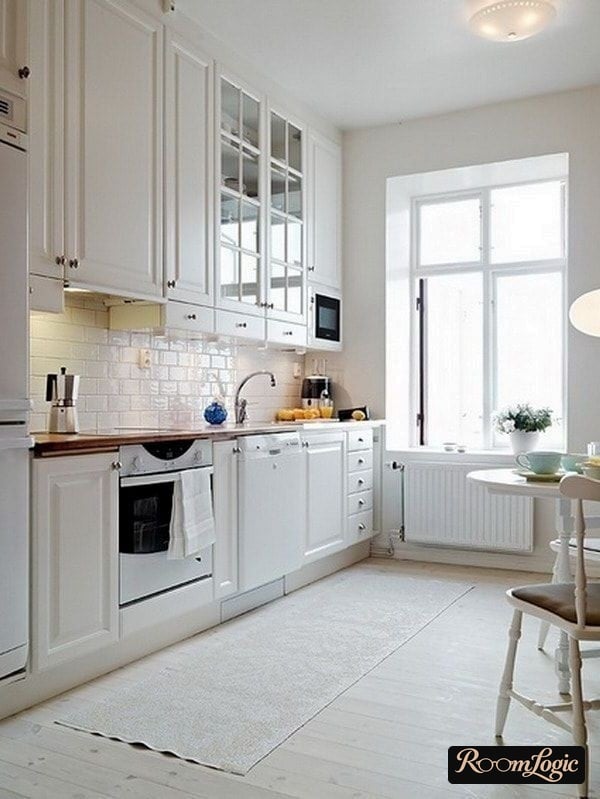White kitchen in Provence style in a Stalin apartment