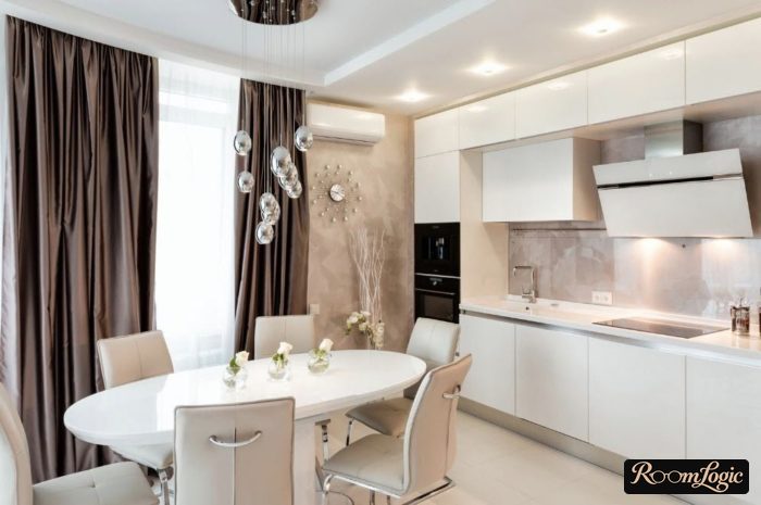 White kitchen with brown long floor-to-ceiling curtains