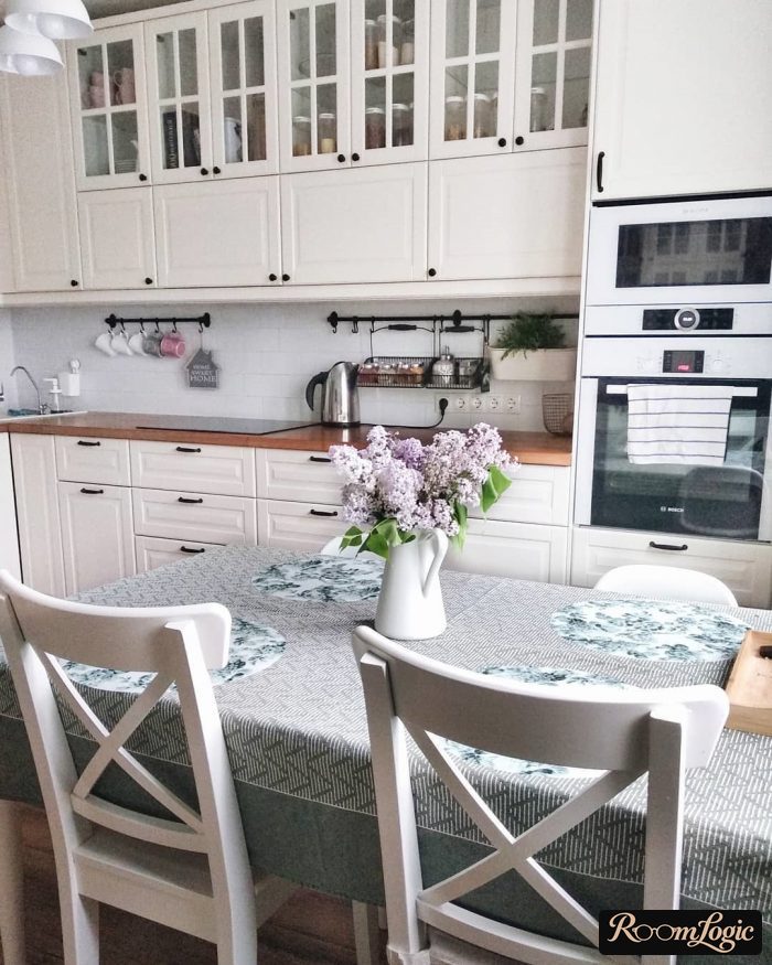 white kitchen with glass inserts