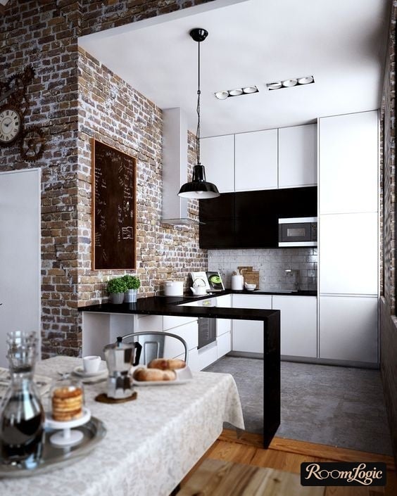 white kitchen with red brick masonry