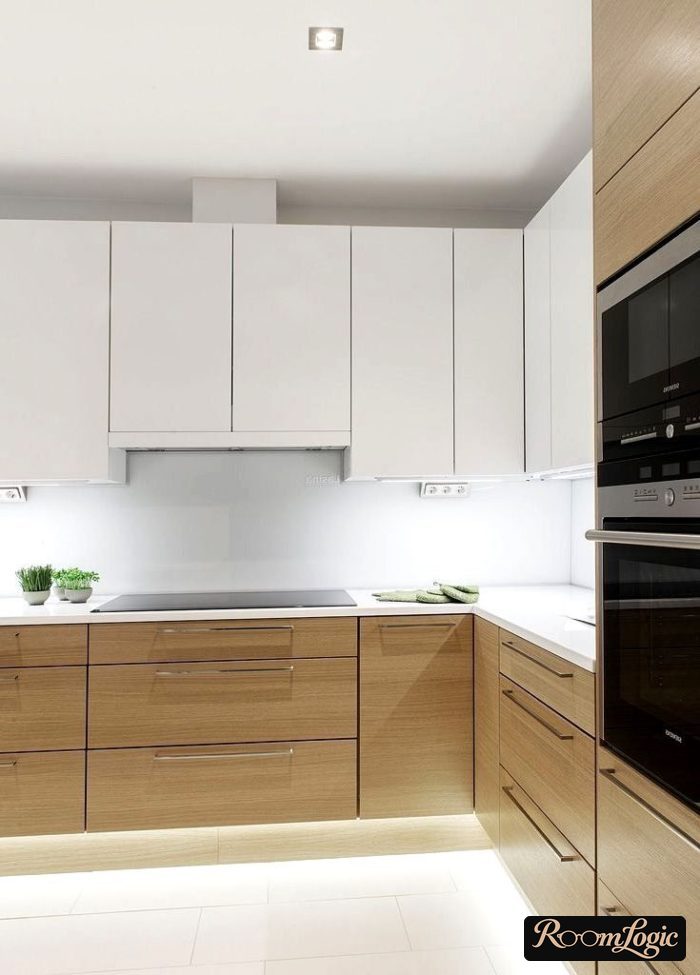 white kitchen with wood and white countertop