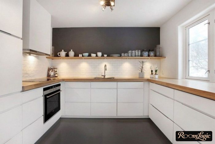White kitchen with wooden open shelves with backlight instead of upper cabinets