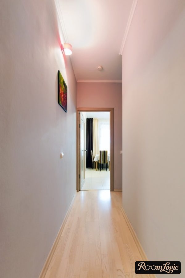 White painted walls in a long hallway