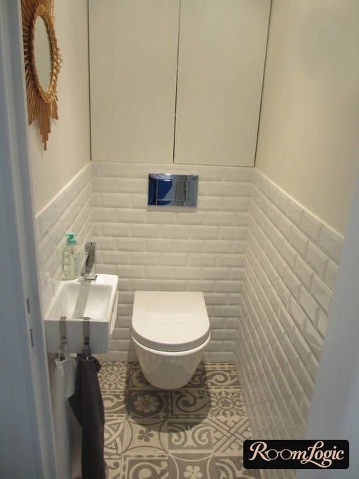 white pig tile to mid-wall in the toilet