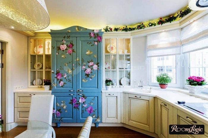 White roller shades in a Provence style on the kitchen window