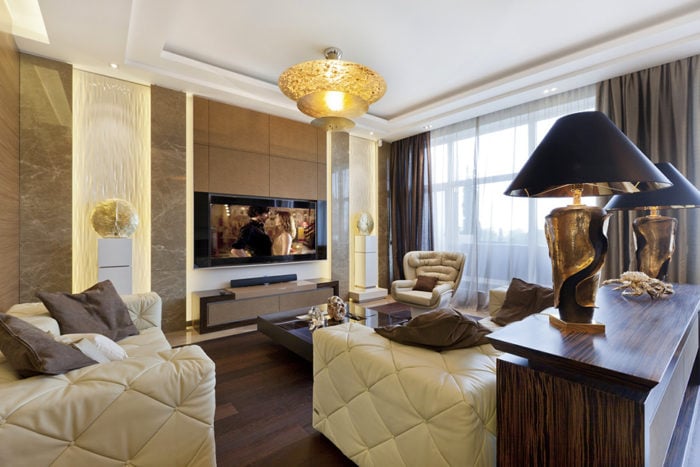 White sofas and chairs with tufted backs